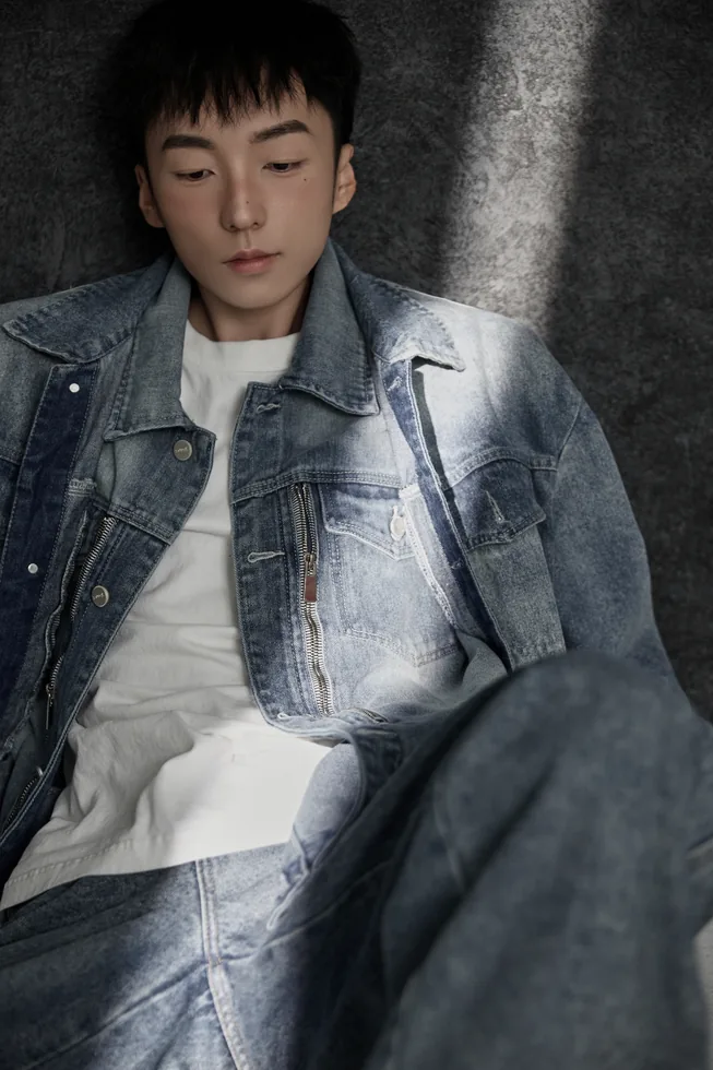 Relaxed seated denim portrait of ZGY